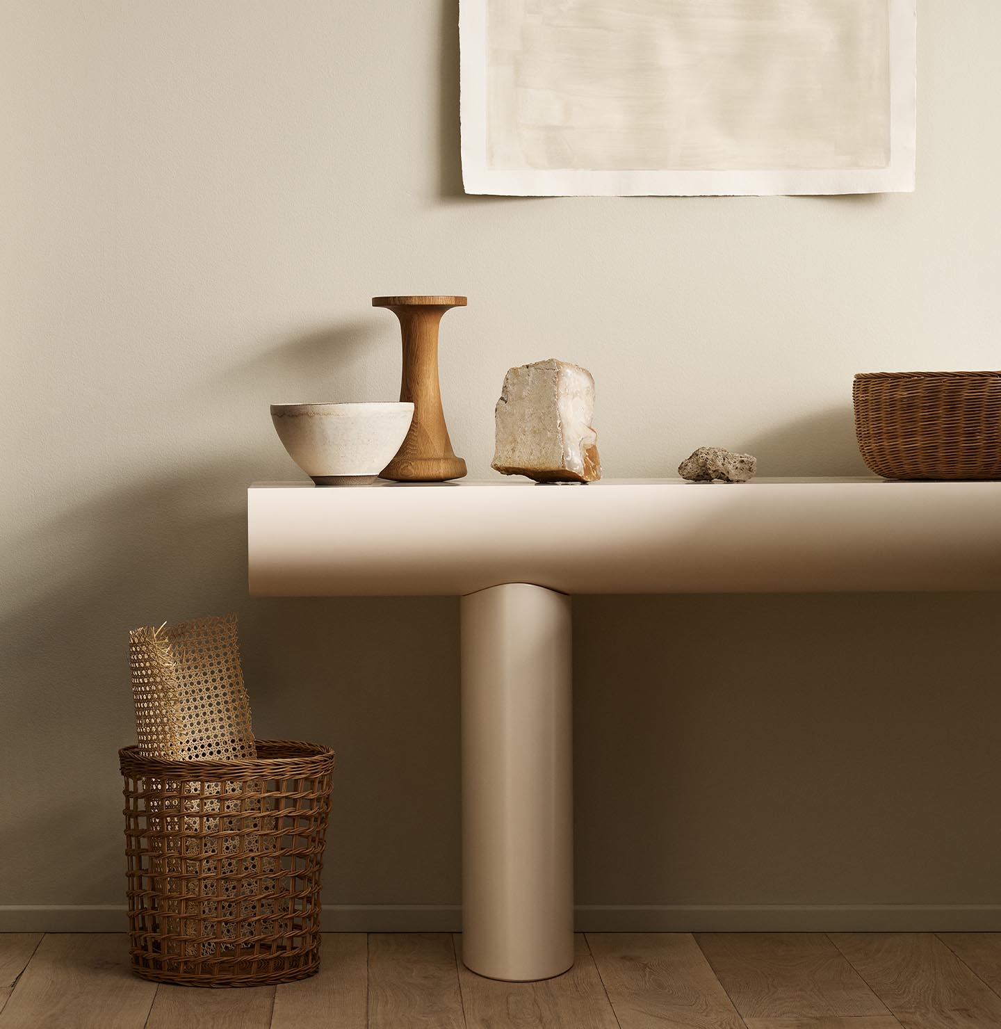 Minimalist console table with decor and baskets against a golden beige wall painted with Jotun's colour 12308 Unbleached.
